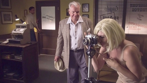 Marilyn takes a photo as her Producer arrives